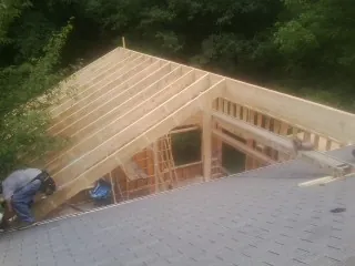 Framing a new roof addition that ties into an existing shingle roof in Fishing Creek